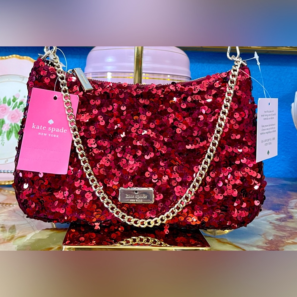 NWT Kate Spade Kiki Sequin Fabric Bag in Deep Berry Color
K9434